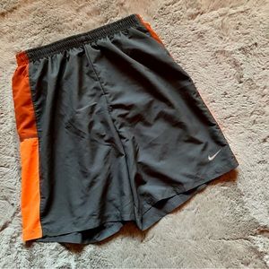 Nike Dri-fit small athletic shorts in grey and orange